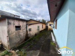 Terreno com construções no bairro Jardim Mauá 