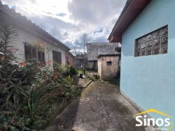 Terreno com construções no bairro Jardim Mauá 