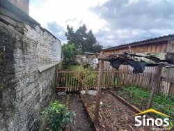 Terreno com construções no bairro Jardim Mauá 
