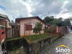 Terreno com construções no bairro Jardim Mauá 