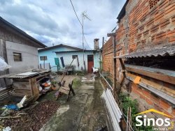 Terreno com construções no bairro Jardim Mauá 