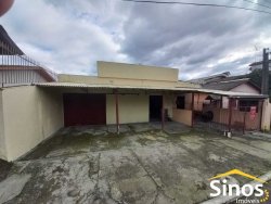 Terreno com construções no bairro Jardim Mauá 