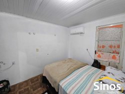 Casa com 03 dormitórios no bairro Rondônia 