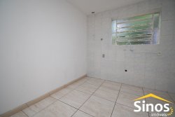 Terreno com 02 casas no bairro Ideal 