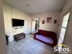 Casa com 3 dormitórios na parte central de Lomba Grande 