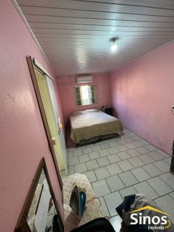 Casa com 3 dormitórios na parte central de Lomba Grande 