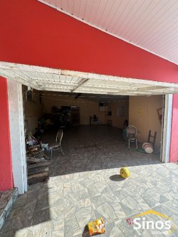 Casa com 3 dormitórios na parte central de Lomba Grande 