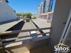 Terreno comercial com casa de 02 dormitórios no bairro Rio Branco 
