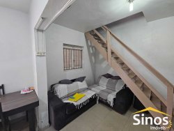 Terreno comercial com casa de 02 dormitórios no bairro Rio Branco 