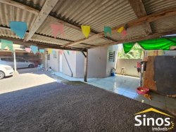 Terreno comercial com casa de 02 dormitórios no bairro Rio Branco 