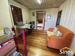 Casa com 05 dormitórios e prédio comercial no bairro Rondônia  