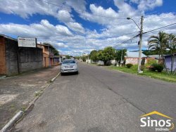 Casa com 05 dormitórios e prédio comercial no bairro Rondônia  
