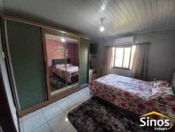 Casa com 04 dormitórios no bairro Santo André  