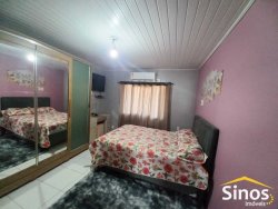Casa com 04 dormitórios no bairro Santo André  
