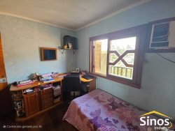 Casa com 03 dormitórios no bairro Ouro Branco 