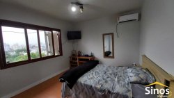 Casa com 03 dormitórios no bairro Ouro Branco 