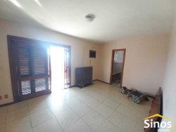 Casa com 03 dormitórios e sala comercial no bairro Rondônia 