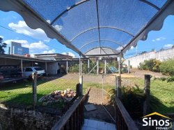 Casa com 03 dormitórios e sala comercial no bairro Rondônia 