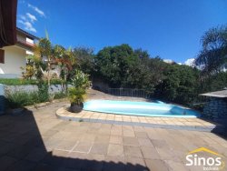 Casa com 03 dormitórios e sala comercial no bairro Rondônia 
