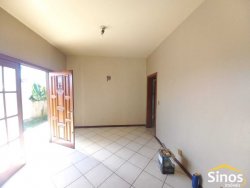Casa com 03 dormitórios e sala comercial no bairro Rondônia 