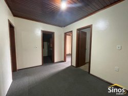 Casa com 03 dormitórios para locação no bairro Rondônia 
