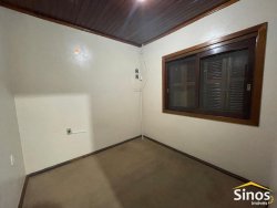 Casa com 03 dormitórios para locação no bairro Rondônia 