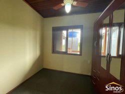 Casa com 03 dormitórios para locação no bairro Rondônia 