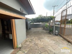 Casa com 03 dormitórios para locação no bairro Rondônia 