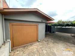 Casa com 03 dormitórios para locação no bairro Rondônia 