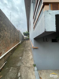 Casa com 03 dormitórios para locação no bairro Rondônia 