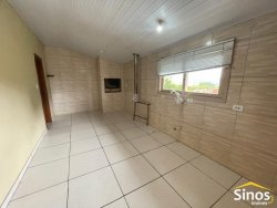 Casa com 03 dormitórios para locação no bairro Rondônia 