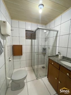 Casa com 03 dormitórios para locação no bairro Rondônia 