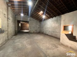 Casa com pavilhão para oficina no bairro Lomba Grande 