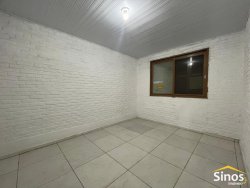 Casa de esquina com 06 dormitórios no bairro Rio Branco 