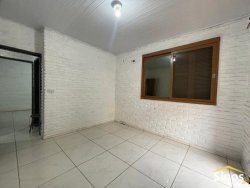 Casa de esquina com 06 dormitórios no bairro Rio Branco 