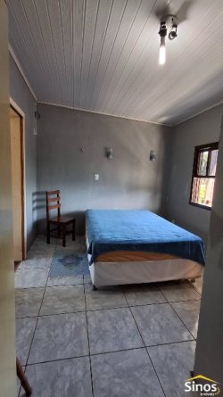 Casa com 02 dormitórios no bairro Vila Nova 