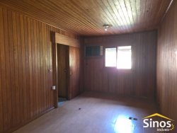 Casa com 04 dormitórios para locação no bairro Lomba Grande 