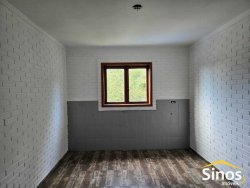 Casa com 04 dormitórios para locação no bairro Lomba Grande 
