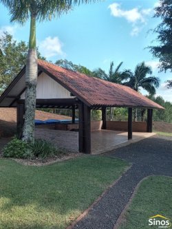Casa com 03 suítes para locação no condomínio Country Village 