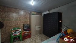 Casa com 03 dormitórios no bairro Rondônia 