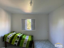 Casa de esquina com 04 dormitórios no bairro Rondônia 