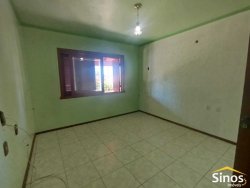Casa com 04 dormitórios no bairro Rondônia 