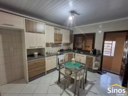 Casa comercial e residencial no bairro Scharlau 