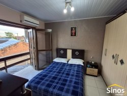 Casa comercial e residencial no bairro Scharlau 
