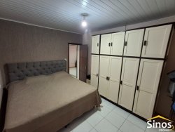 Casa comercial e residencial no bairro Scharlau 