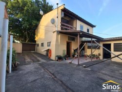 Casa comercial e residencial no bairro Scharlau 
