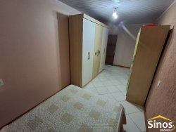 Casa comercial e residencial no bairro Scharlau 