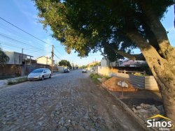 Casa comercial e residencial no bairro Scharlau 