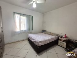 Apartamento térreo com 03 dormitórios no Edifício Três de Outubro  