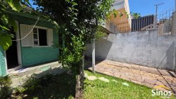 Terreno com 02 casas no loteamento Jardim Imperial  